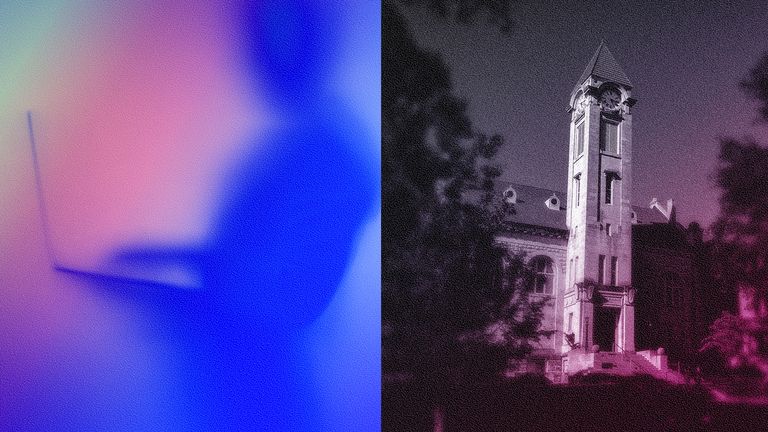 Silhouette of a person holding a laptop and Indiana University