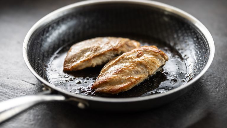 Image may contain Food Meat Pork Cooking and Frying